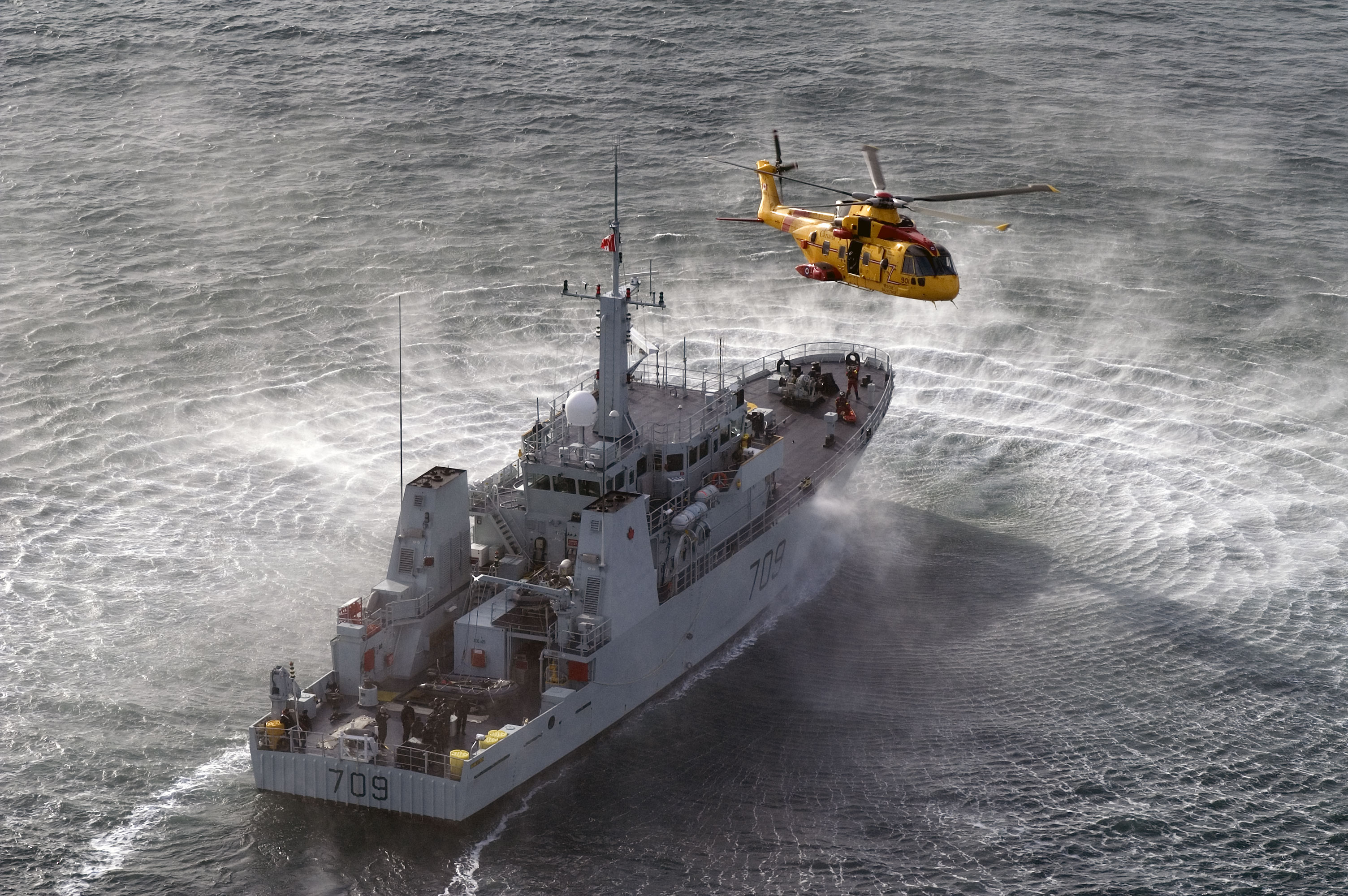 Helicopter and ship on the water